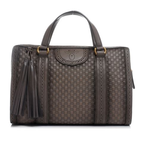 gucci duilio brogue boston black leather bag|Gucci canvas bag.